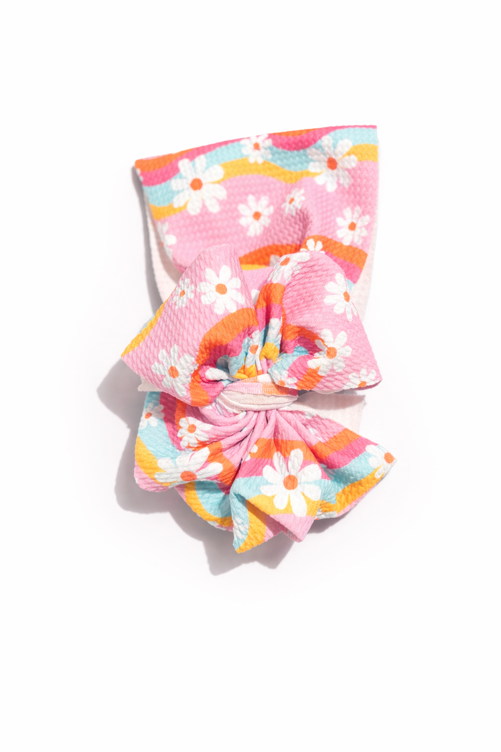 GROOVY FLOWER BOW